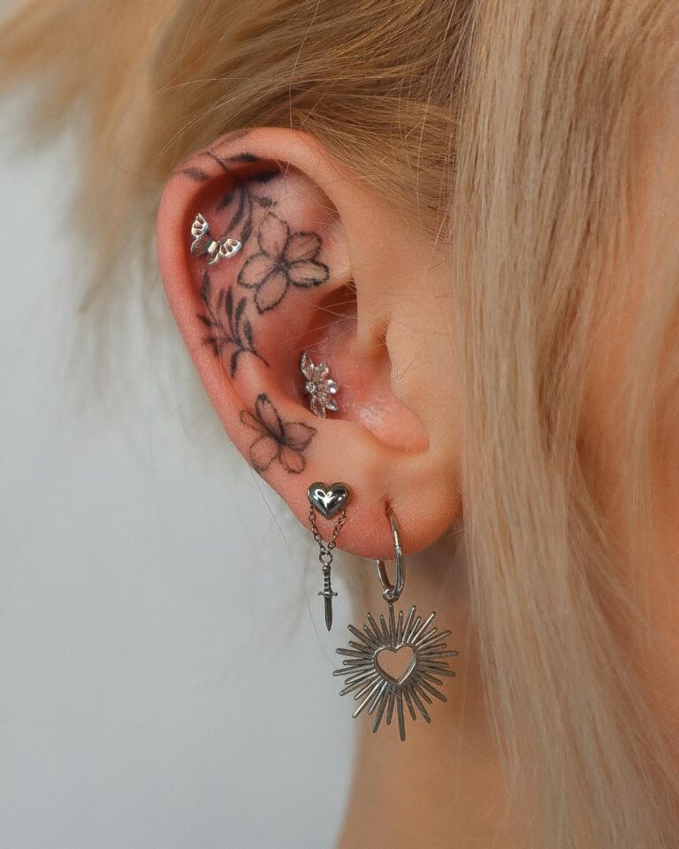 piercing kraków, piercing ucha, tatuaż ucha, tatuaż na twarzy, kolczyk w brwi
